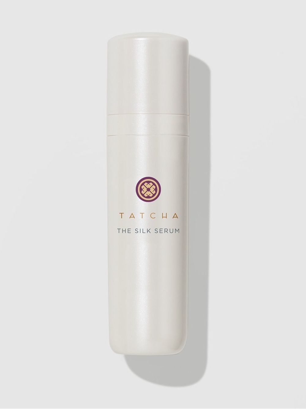 Tatcha Silk Serum Bottle in Pearl White with Purple & Gold Logo